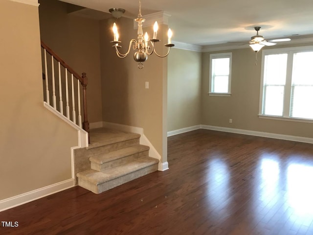 115 Ballyliffen Ln, Cary, NC 27519 - stairs featuring wood finished floors, baseboards, ceiling fan, a chandelier, and crown molding