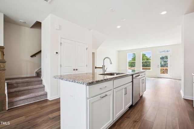 744 Parc Townes Dr Unit 34, Wendell, NC 27591 - kitchen featuring a sink, dishwasher, light stone counters, white cabinets, and dark wood finished floors