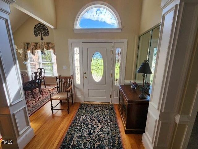 3409 Bennyfield Ct, Fuquay Varina, NC 27526 - foyer featuring light wood-style floors and high vaulted ceiling