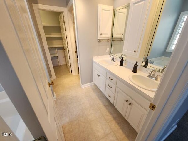 3409 Bennyfield Ct, Fuquay Varina, NC 27526 - bathroom featuring double vanity and a bath