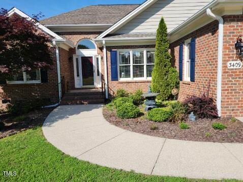 3409 Bennyfield Ct, Fuquay Varina, NC 27526 - entrance to property featuring brick siding