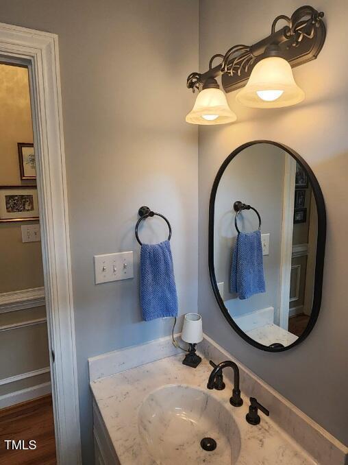 3409 Bennyfield Ct, Fuquay Varina, NC 27526 - bathroom featuring vanity and wood finished floors
