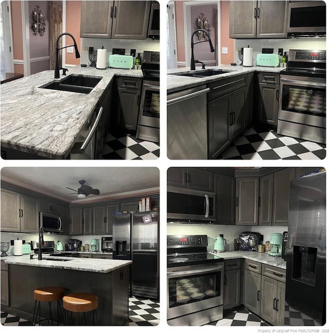 707 Connaly Dr, Hope Mills, NC 28348 - kitchen featuring appliances with stainless steel finishes, light flooring, a sink, and a peninsula