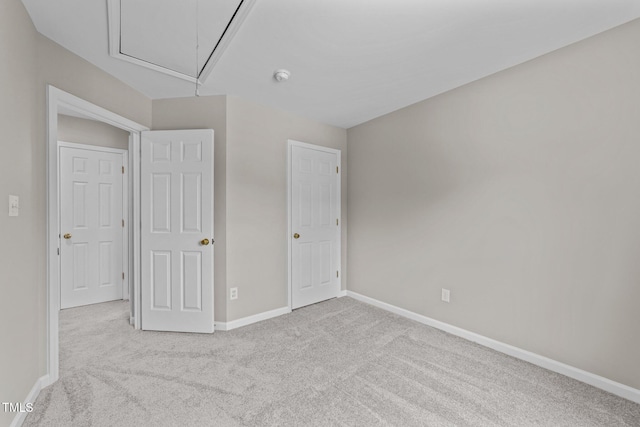 5012 Silverdene St, Raleigh, NC 27616 - unfurnished bedroom with attic access, carpet floors, and baseboards