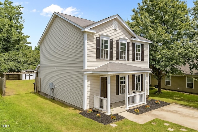 5012 Silverdene St, Raleigh, NC 27616 - view of side of home with a lawn and a porch