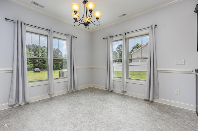 235 Camden Place St, Princeton, NC 27569 - spare room featuring a chandelier, crown molding, and baseboards