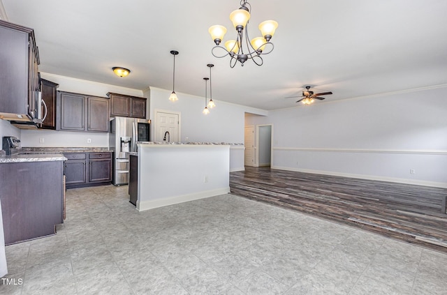 235 Camden Place St, Princeton, NC 27569 - kitchen featuring crown molding, ceiling fan, appliances with stainless steel finishes, dark brown cabinetry, and open floor plan