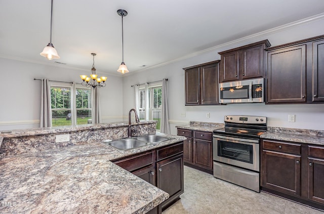 235 Camden Place St, Princeton, NC 27569 - kitchen featuring appliances with stainless steel finishes, a sink, a chandelier, dark brown cabinetry, and decorative light fixtures