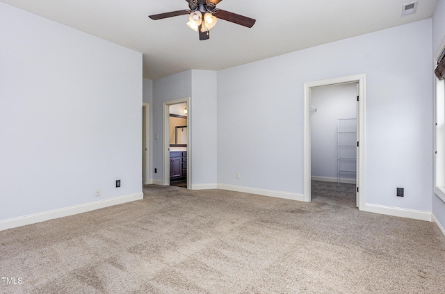 235 Camden Place St, Princeton, NC 27569 - empty room with a ceiling fan, carpet, and baseboards