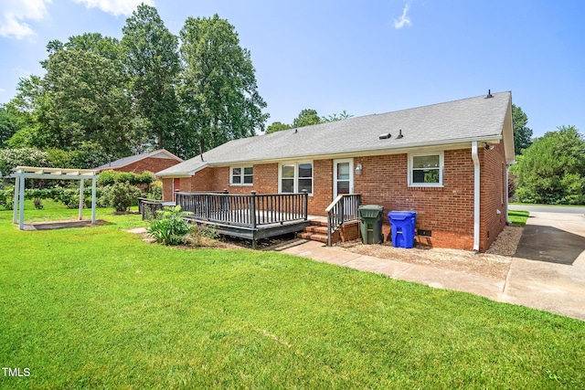5 Windsor Pl, Mebane, NC 27302 - rear view of house with a deck, a yard, brick siding, a pergola, and a shingled roof