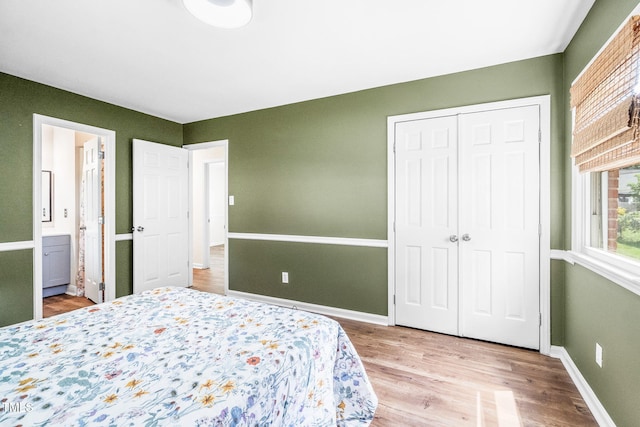 5 Windsor Pl, Mebane, NC 27302 - bedroom featuring wood finished floors, a closet, baseboards, and connected bathroom