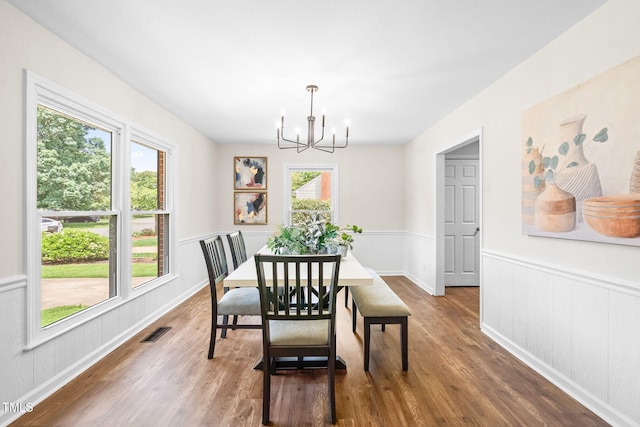 5 Windsor Pl, Mebane, NC 27302 - dining room featuring a chandelier, wood finished floors, and wainscoting