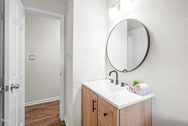 5 Windsor Pl, Mebane, NC 27302 - bathroom featuring vanity, wood finished floors, and baseboards