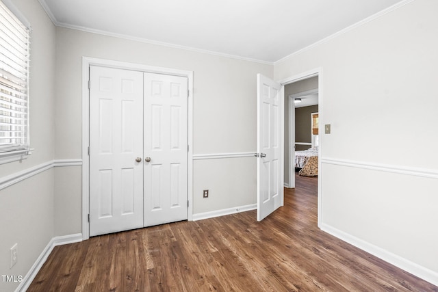 5 Windsor Pl, Mebane, NC 27302 - unfurnished bedroom featuring wood finished floors, baseboards, ornamental molding, and a closet