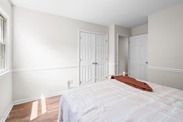 5 Windsor Pl, Mebane, NC 27302 - bedroom with wood finished floors, baseboards, and a closet