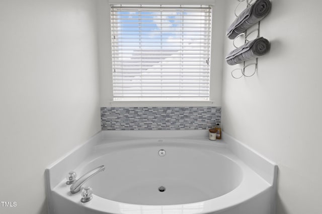5332 Seaspray Ln, Raleigh, NC 27610 - full bath featuring a garden tub and healthy amount of natural light