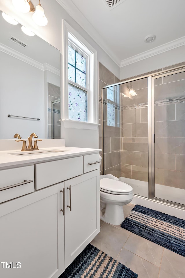 121 Canyon Gap Way, Raleigh, NC 27610 - full bath with vanity, a shower stall, crown molding, toilet, and tile patterned floors