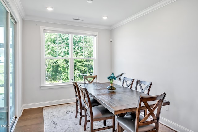 121 Canyon Gap Way, Raleigh, NC 27610 - dining area featuring wood finished floors, baseboards, ornamental molding, and recessed lighting