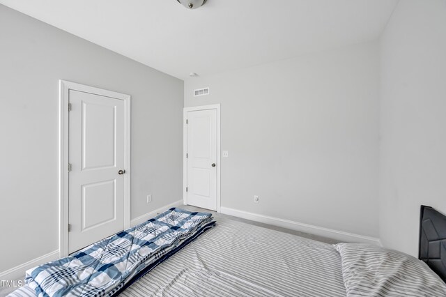 121 Canyon Gap Way, Raleigh, NC 27610 - bedroom with baseboards and carpet floors