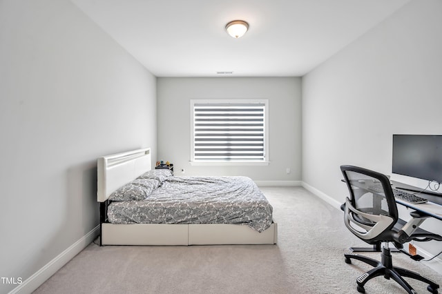 121 Canyon Gap Way, Raleigh, NC 27610 - carpeted bedroom with a desk and baseboards