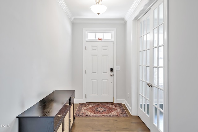 121 Canyon Gap Way, Raleigh, NC 27610 - entryway with crown molding, wood finished floors, and baseboards