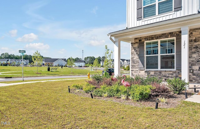 121 Canyon Gap Way, Raleigh, NC 27610 - view of grassy yard featuring covered porch