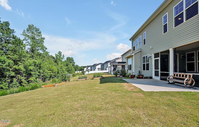 121 Canyon Gap Way, Raleigh, NC 27610 - view of green lawn featuring a patio