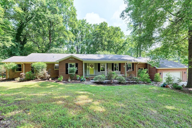 1416 Bramble Dr, Durham, NC 27712 - ranch-style home with brick siding, a garage, a front yard, and covered porch