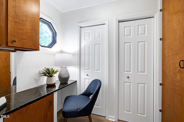 1416 Bramble Dr, Durham, NC 27712 - home office featuring wood finished floors and built in desk