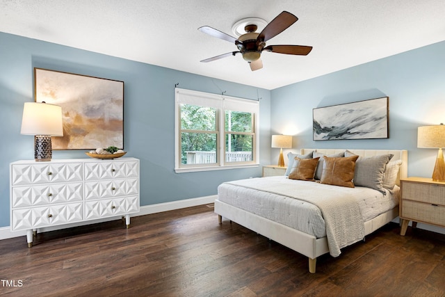 1416 Bramble Dr, Durham, NC 27712 - bedroom with wood finished floors, baseboards, and ceiling fan