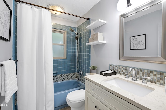 1416 Bramble Dr, Durham, NC 27712 - full bathroom with vanity, toilet, shower / bath combo, decorative backsplash, and a textured ceiling