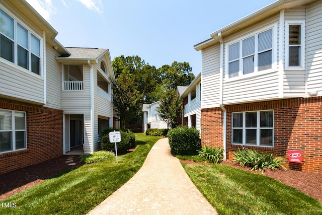 1911 Falls Landing Dr Unit 103, Raleigh, NC 27614 - view of home's community with a lawn
