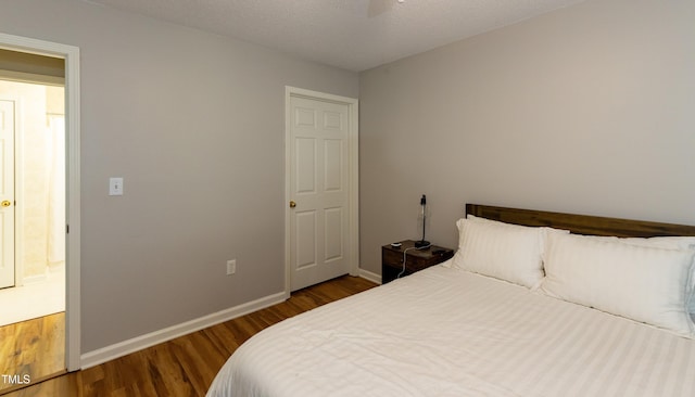 1911 Falls Landing Dr Unit 103, Raleigh, NC 27614 - bedroom with wood finished floors and baseboards