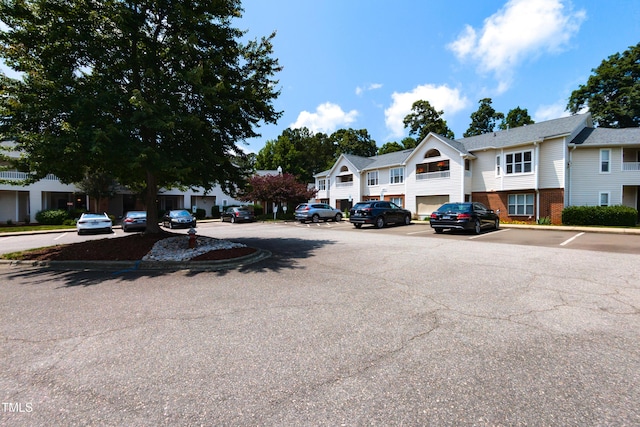 1911 Falls Landing Dr Unit 103, Raleigh, NC 27614 - view of asphalt road with a residential view and curbs