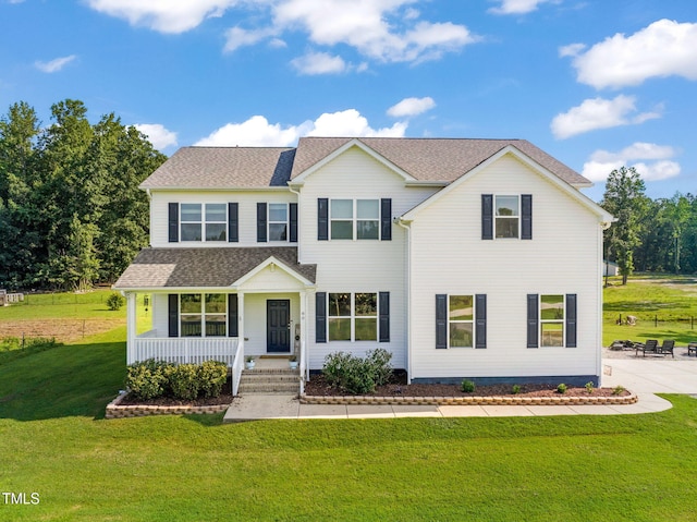 80 Shartree Farms Ln, Louisburg, NC 27549 - view of front facade featuring a front lawn, a porch, and a shingled roof