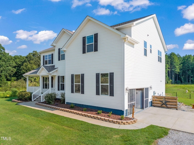 80 Shartree Farms Ln, Louisburg, NC 27549 - traditional home featuring driveway, a front lawn, and an attached garage