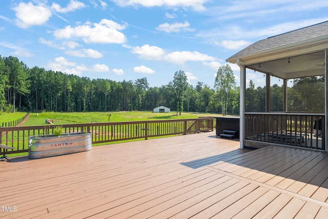 80 Shartree Farms Ln, Louisburg, NC 27549 - deck featuring a lawn, a sunroom, and a wooded view