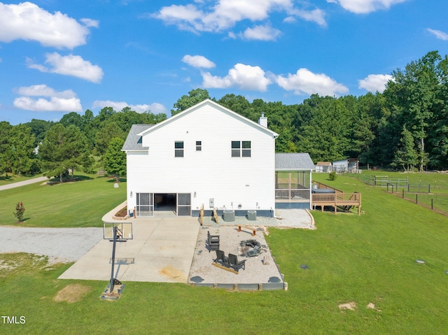 80 Shartree Farms Ln, Louisburg, NC 27549 - rear view of property with a sunroom, a patio area, and a chimney