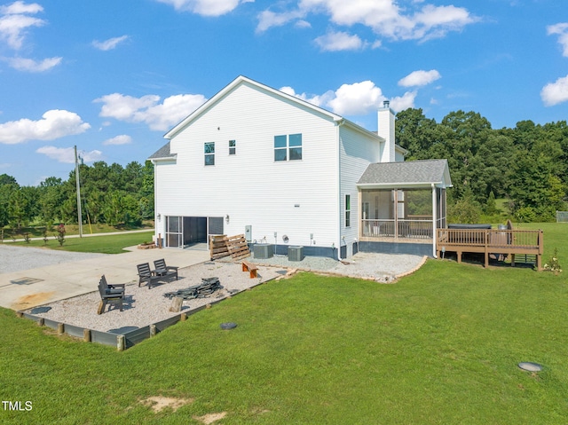 80 Shartree Farms Ln, Louisburg, NC 27549 - back of property with a chimney, a yard, a patio, a wooden deck, and a sunroom