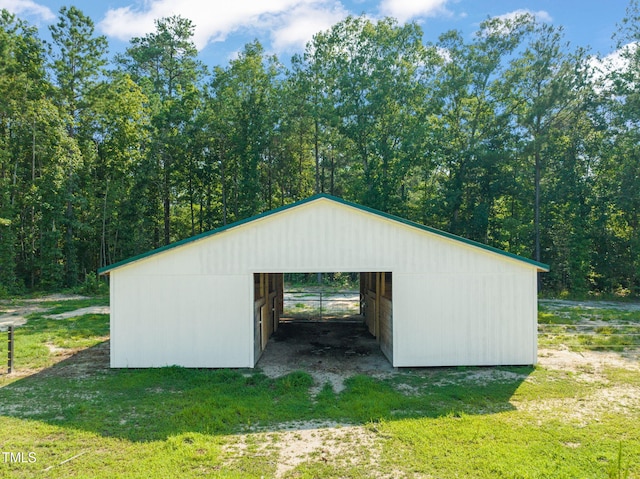 80 Shartree Farms Ln, Louisburg, NC 27549 - view of pole building with a yard and a view of trees