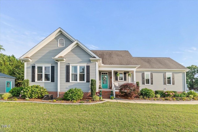 817 Mossy Oak Dr, Fuquay Varina, NC 27526 - view of front of home with covered porch and a front yard