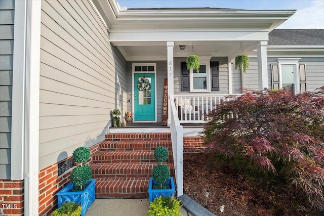 817 Mossy Oak Dr, Fuquay Varina, NC 27526 - property entrance featuring covered porch