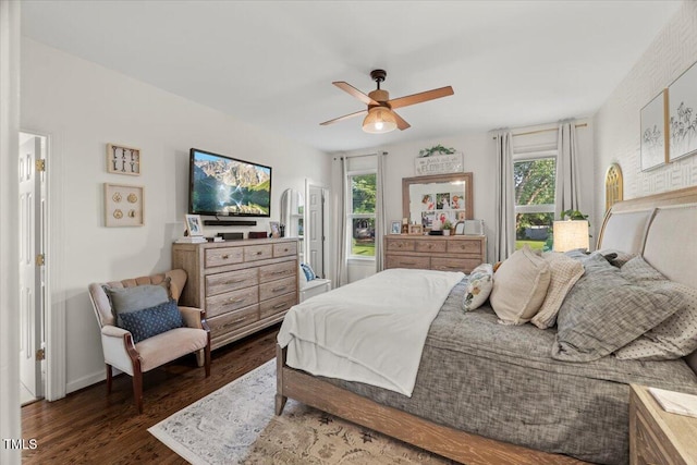 817 Mossy Oak Dr, Fuquay Varina, NC 27526 - bedroom with dark wood-type flooring and ceiling fan