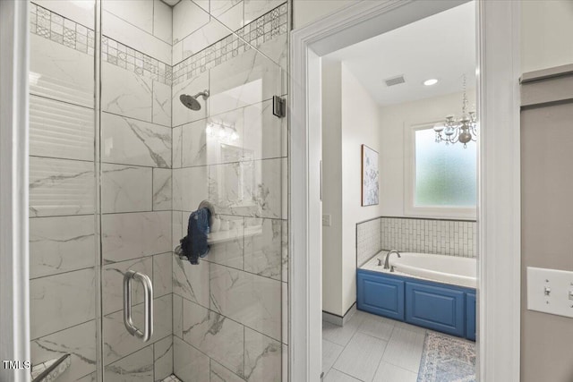 817 Mossy Oak Dr, Fuquay Varina, NC 27526 - full bath featuring a shower stall, a bath, and a chandelier