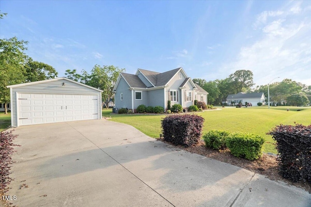 817 Mossy Oak Dr, Fuquay Varina, NC 27526 - view of front of house featuring a detached garage, a front yard, and an outbuilding