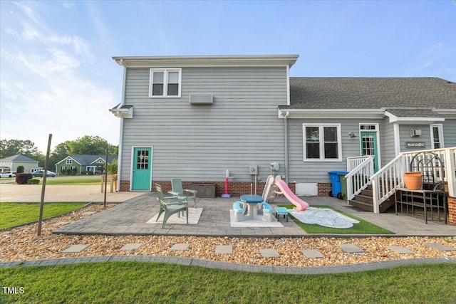 817 Mossy Oak Dr, Fuquay Varina, NC 27526 - rear view of property featuring a patio