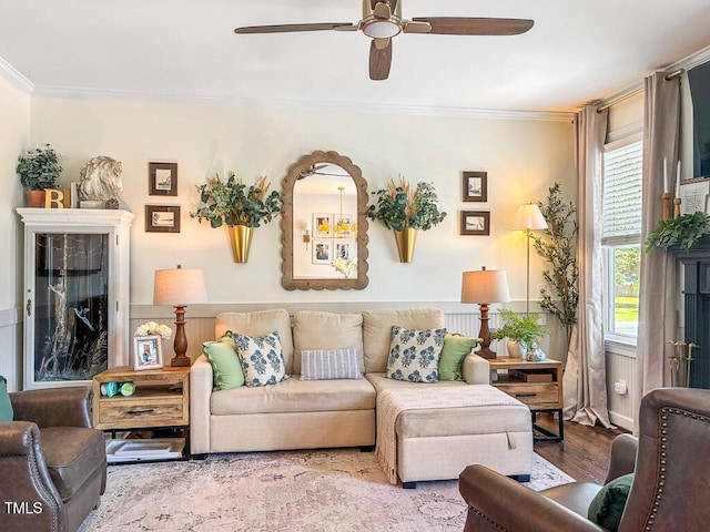 817 Mossy Oak Dr, Fuquay Varina, NC 27526 - living area featuring a ceiling fan, ornamental molding, and wood finished floors