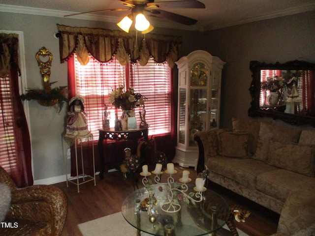 4302 Bona Ct, Raleigh, NC 27604 - living room with ornamental molding, ceiling fan, wood finished floors, healthy amount of natural light, and baseboards