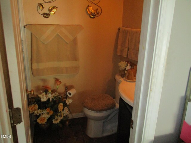 4302 Bona Ct, Raleigh, NC 27604 - half bathroom featuring toilet and tile patterned flooring