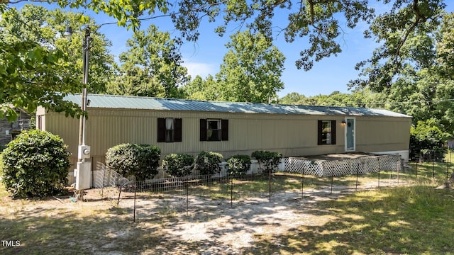 1355 Sykes Rd, Spring Hope, NC 27882 - view of home's exterior featuring metal roof